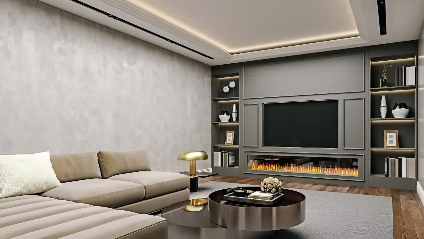 Modern living room with a beige sectional sofa, sleek coffee tables, and a built-in wall unit with a large TV and fireplace. Ambient lighting creates a cozy atmosphere.