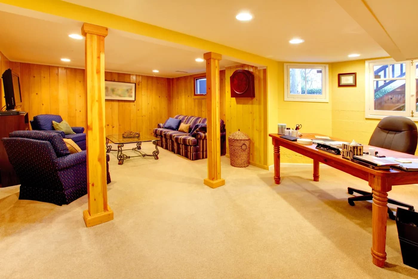 How To Create A Multifunctional Basement With Basement Finishing In Foxboro, MA Everything You Need To Know About Getting The Most Out Of Your Basement Space Many homeowners picture their ideal basement as a gorgeous home bar, an entertainment area, a home office, a home gym, or more – but what if you can’t decide? When you embark on a basement finishing project in Foxboro, MA, you don’t have to choose just one use. No matter the size of your basement, you can always make it a multipurpose area. While an open floor plan in your basement may be fun and perfect for entertaining, you may need more out of your basement than that. If you work from home but also need to prioritize your health, consider dividing your basement into two rooms – the first as a home office and the second as a home gym. If you have a smaller basement, full walls may make the space feel too cramped, so consider options like half-walls to make divided sections for a more open feel. No matter what you need out of your East Coast basement, Lux Renovations is here to help. We’ve highlighted some of the best ways to get the most use out of your basement by creating the ultimate multifunctional space. What Are Your Top Priorities For Your Foxboro, MA Basement? Begin by listing what you want the most from your basement. Do you need your basement as an additional bedroom for your growing family? Do you or someone in your household work from home and desperately need a home office free from distractions? Whatever you need your basement for, list the top needs. This will help you better organize your space without feeling overwhelmed or overcrowding it. Plan Your Full Basement Layout For Optimal Flow When creating a multifunctional basement, you want the space to feel balanced and fluid. This means not having to walk through multiple walkways or feel crowded in your basement. Use walls or wall panels to separate smaller spaces, like bathrooms or offices, but walls don’t have to be the only divider between spaces. Large furniture, like shelves and sofas, can separate areas – such as play and bar areas. Use Classic Neutrals Throughout Your Full Basement To Create Unified Spaces Few choices are as important to the overall flow in multifunctional basements – especially smaller ones – as paint colors. While deep, jewel-toned hues can create depth and elegance in certain areas, they may not work best for a smaller multi-functional space. Opting for neutral colors helps create a unified look and better flow in your basement. If you like rich colors but are afraid darker walls will make your basement feel dreary and cramped, consider using richer colors in your furnishings. Even a darker trim on the walls would help your basement pop. Don’t Skimp On Your East Coast Basement’s Storage Solutions Clutter makes any space feel crowded, and if your multifunctional basement is cluttered and messy, you may not want to even spend time in it. Having plenty of storage options in your Foxboro, MA basement is key to making it feel fluid and welcoming, no matter the size. Use tall shelves, cabinets, bins, and more to give everything in your basement its proper place. If you have low ceilings, opt for tall, floor-to-ceiling shelves to make your basement feel more spacious and taller. These tall storage solutions also keep everything organized, minimizing clutter – and we all know that clutter can make even an ample space feel small! Transform Your Foxboro, MA Basement Into The Perfect Multifunctional Space With Lux Renovations Creating the ultimate multifunctional space that suits all your needs can be challenging. That’s why you should always turn to the experts for such a significant investment. At Lux Renovations, we use the most trusted name in the home renovation industry – Owens Corning – for products and services built to last. If you’re ready to get started on your perfect basement, call Lux Renovations at + 877-639-2341 and schedule your free estimate!