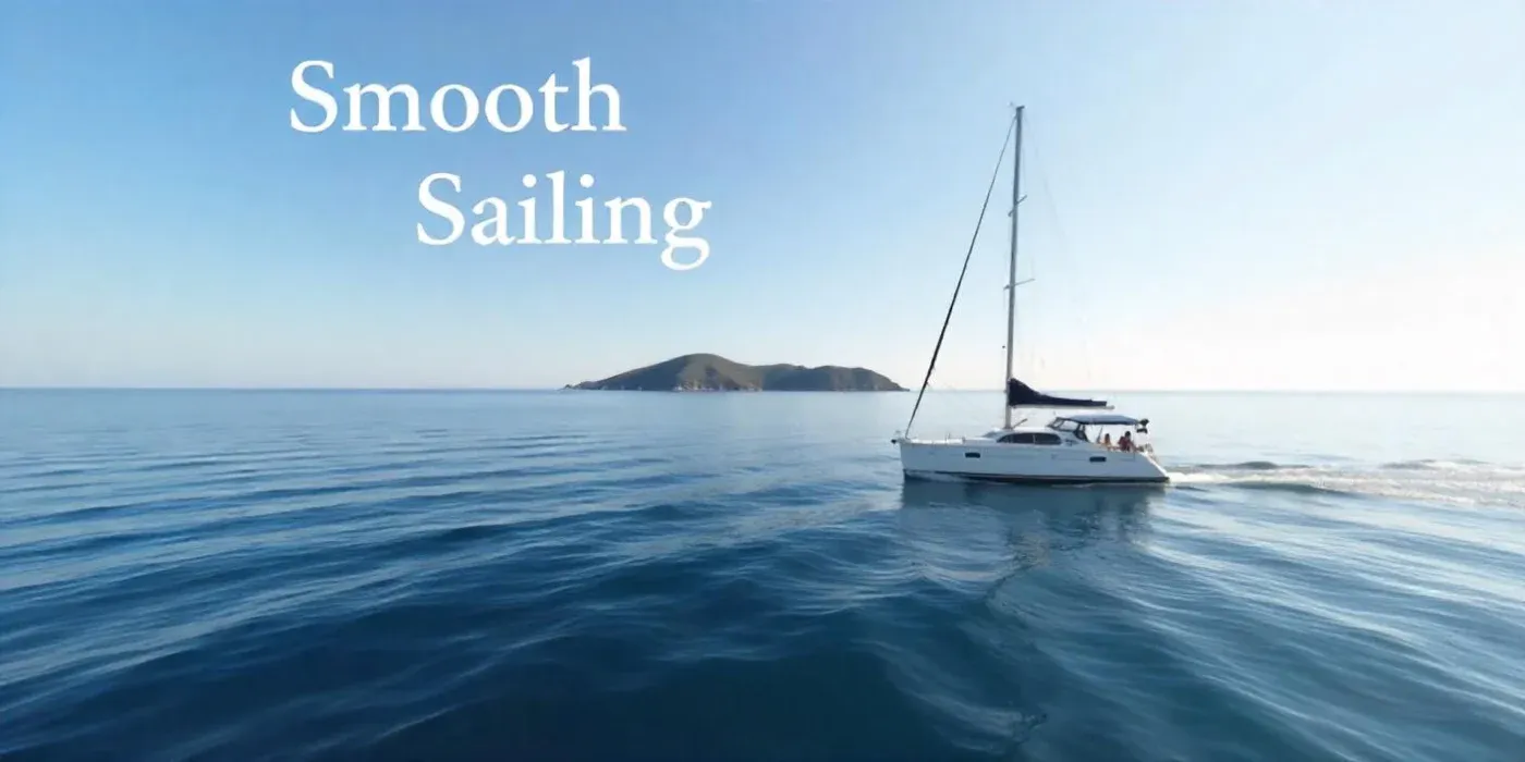 A sailboat glides on calm, blue ocean waters under a clear sky, with an island in the distance. The white text "Smooth Sailing" is in the upper left.