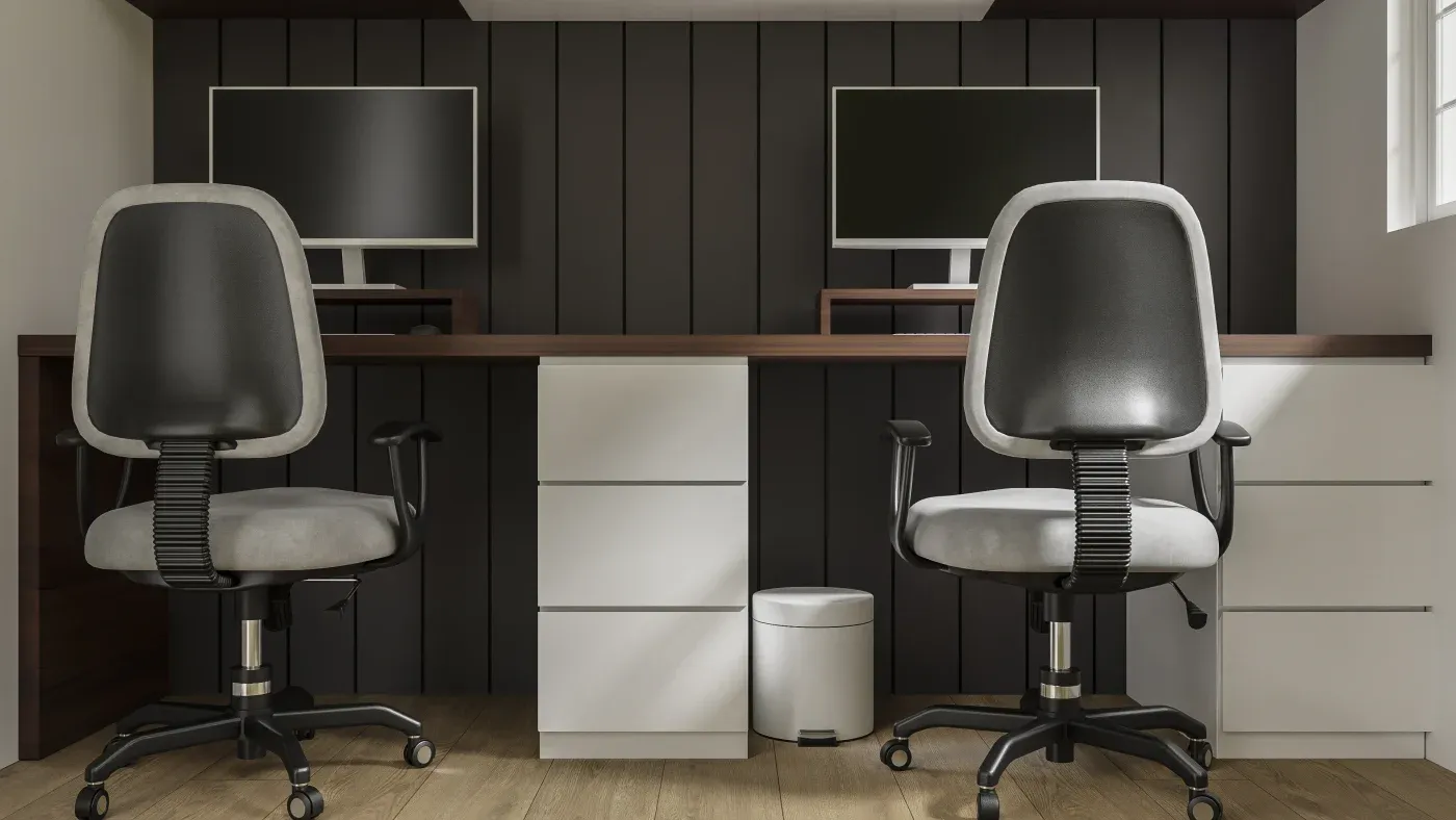 Modern office with two black swivel chairs facing dual monitors on a dark wood desk, white drawers beneath. Minimalist, professional atmosphere.